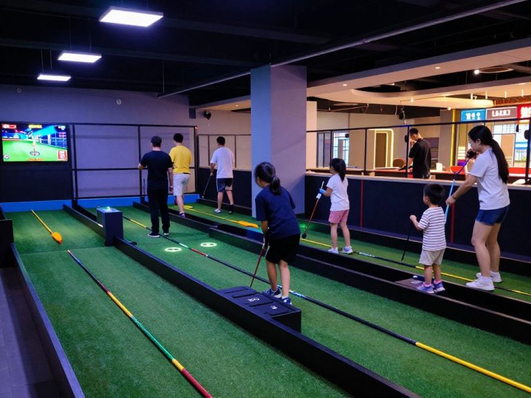 Families enjoying indoor mini golf in Columbia SC