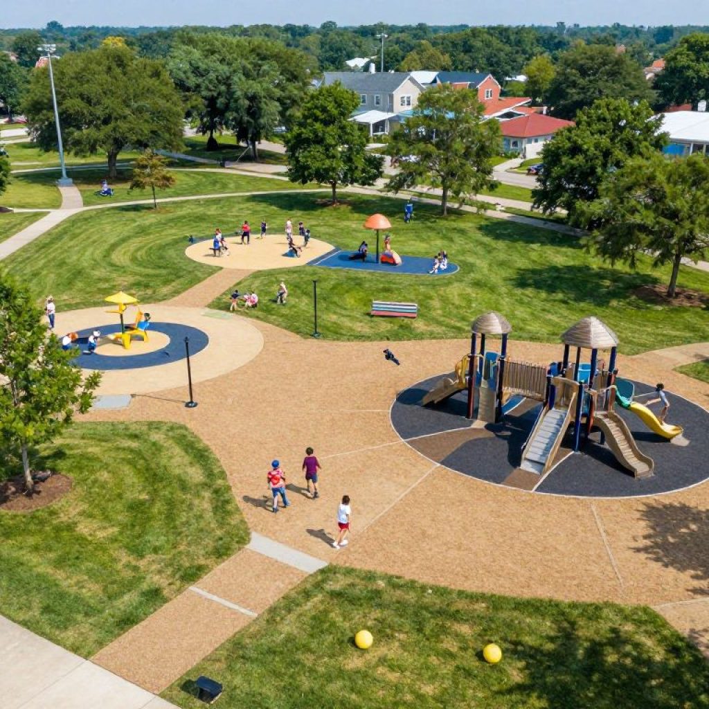 Aerial view of a revitalized park in Irmo with families enjoying the green spaces.