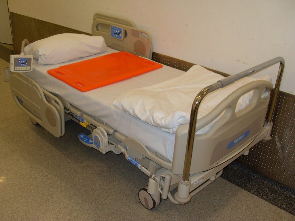 Hospital bed in a patient room